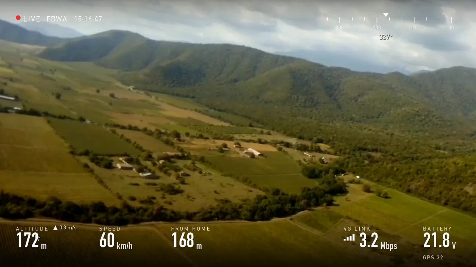 Wide valley of vineyards with a ridge on the left